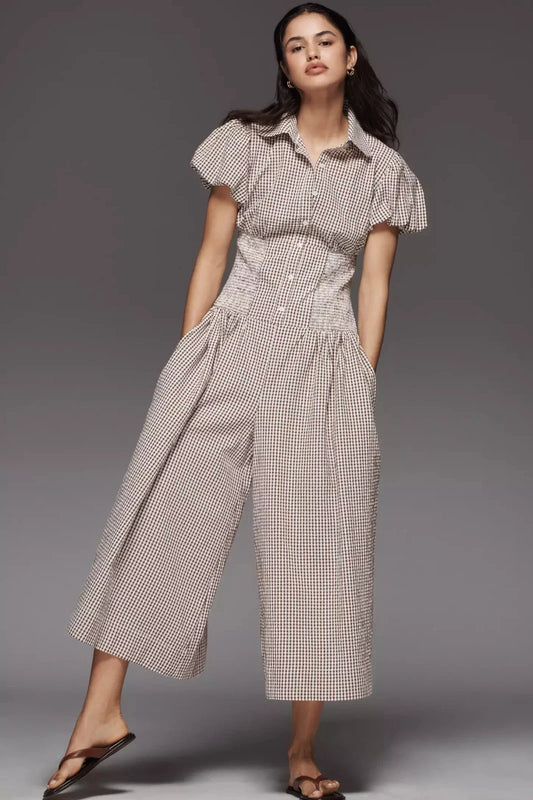 Anthropologie Maeve Puff-Sleeve Smock Wide-Leg Jumpsuit – front on model brown