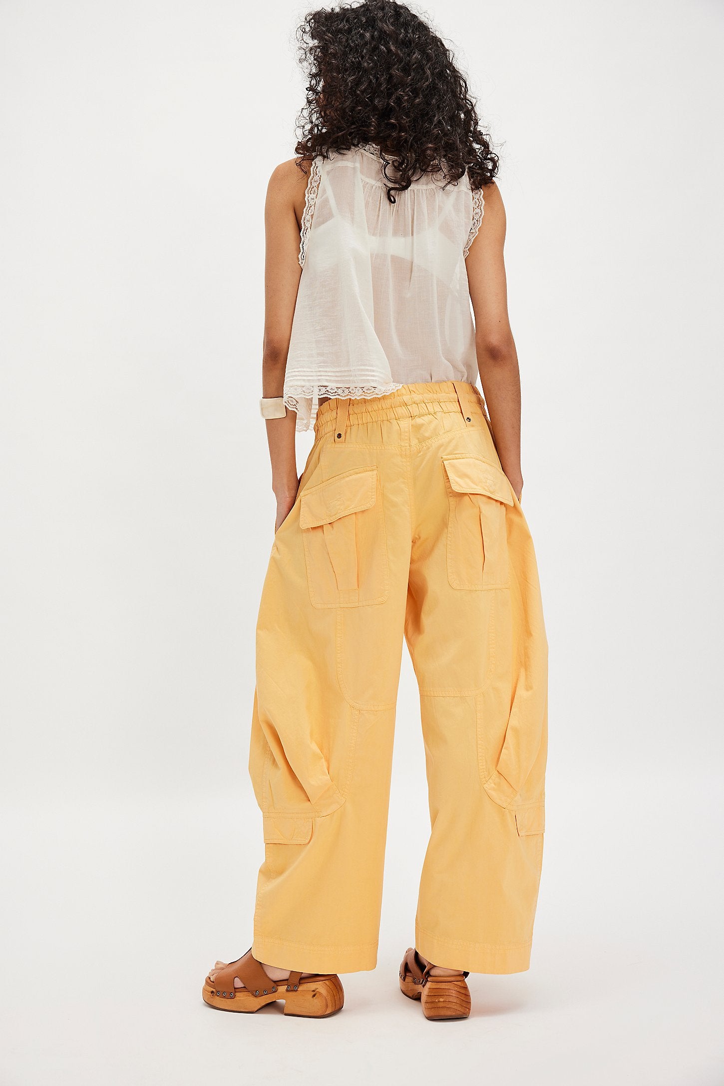Free People Onset Pants - back view on model yellow
