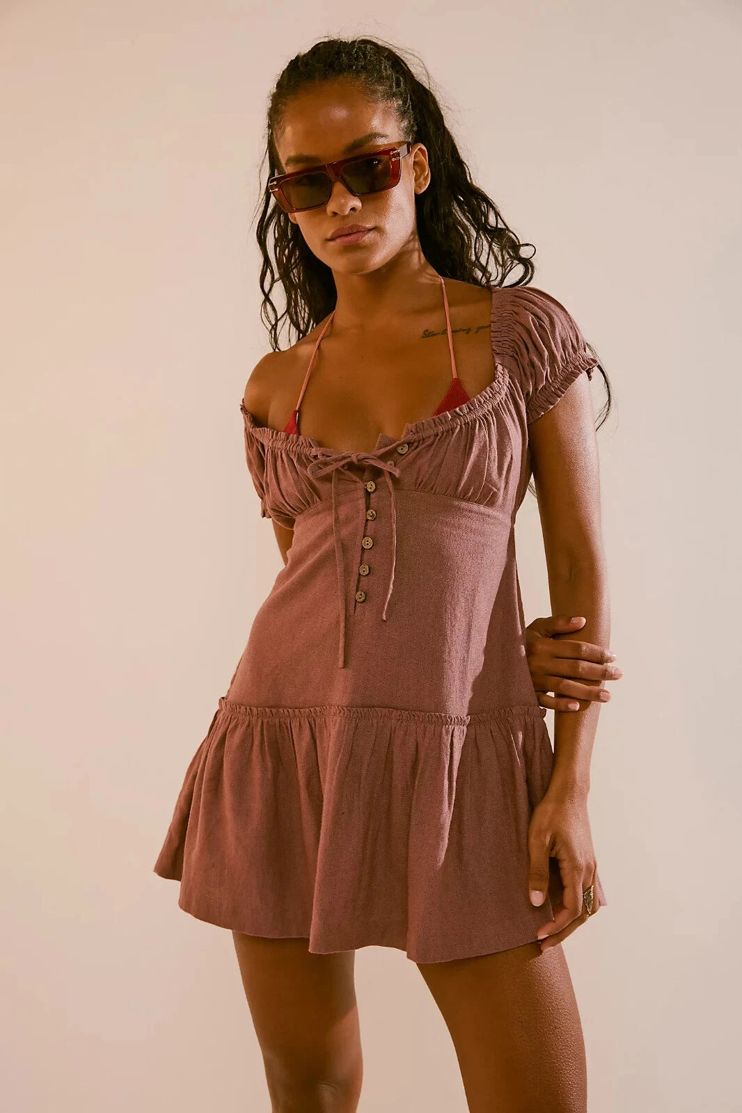 Free People Perri Linen Drop-Waist Mini Dress – front on model brown