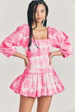 LoveShackFancy Chai Dress – front on model pink